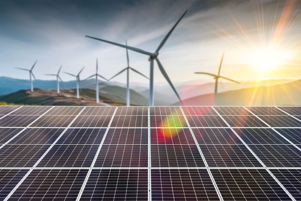 Dynamic Event-Triggered Voltage Control for Islanded Microgrids Using High-Fidelity Simulations